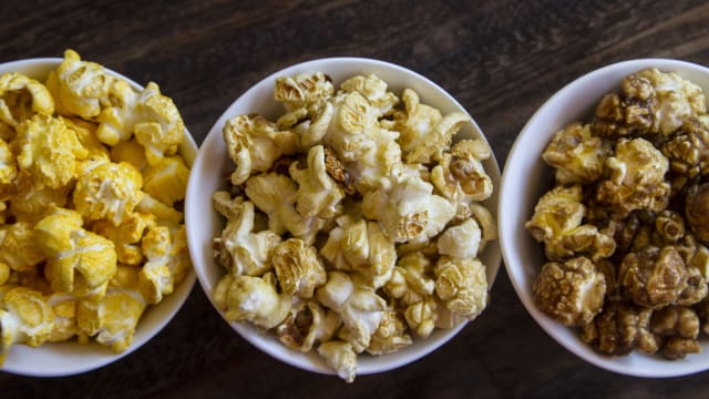 Caramel-corn, Chicago style and White Cheddar! Choose your favorite gourmet popcorn and we'll give you a movie to get cozy with at home! 